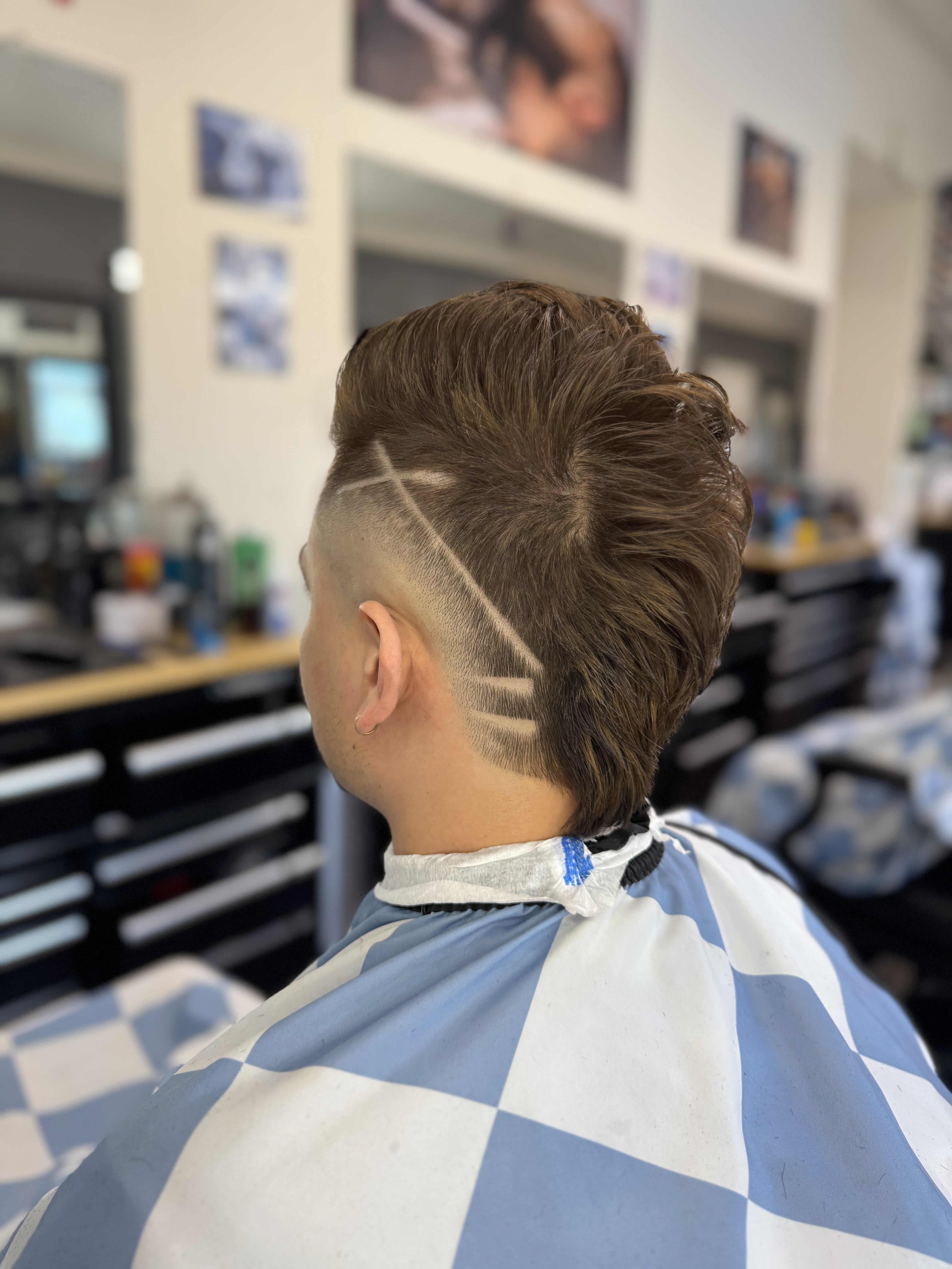 Design cut — back view at Dawson Creek Barbershop